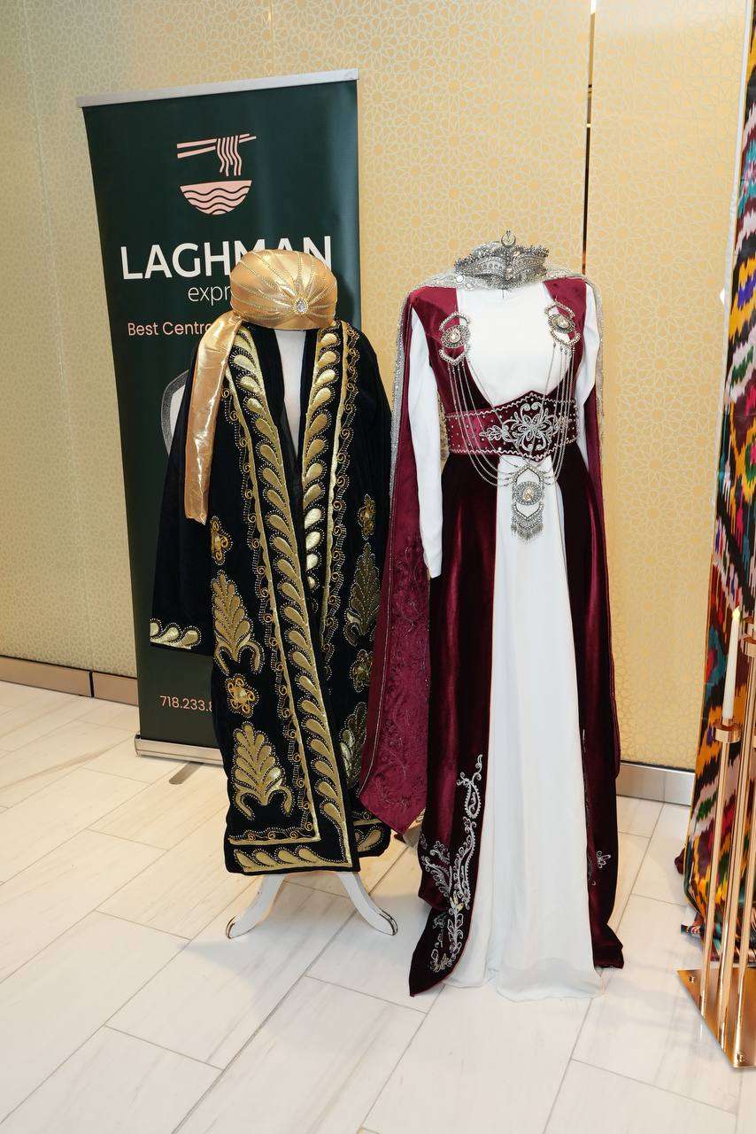 Traditional gown and jewelry displayed on a mannequin